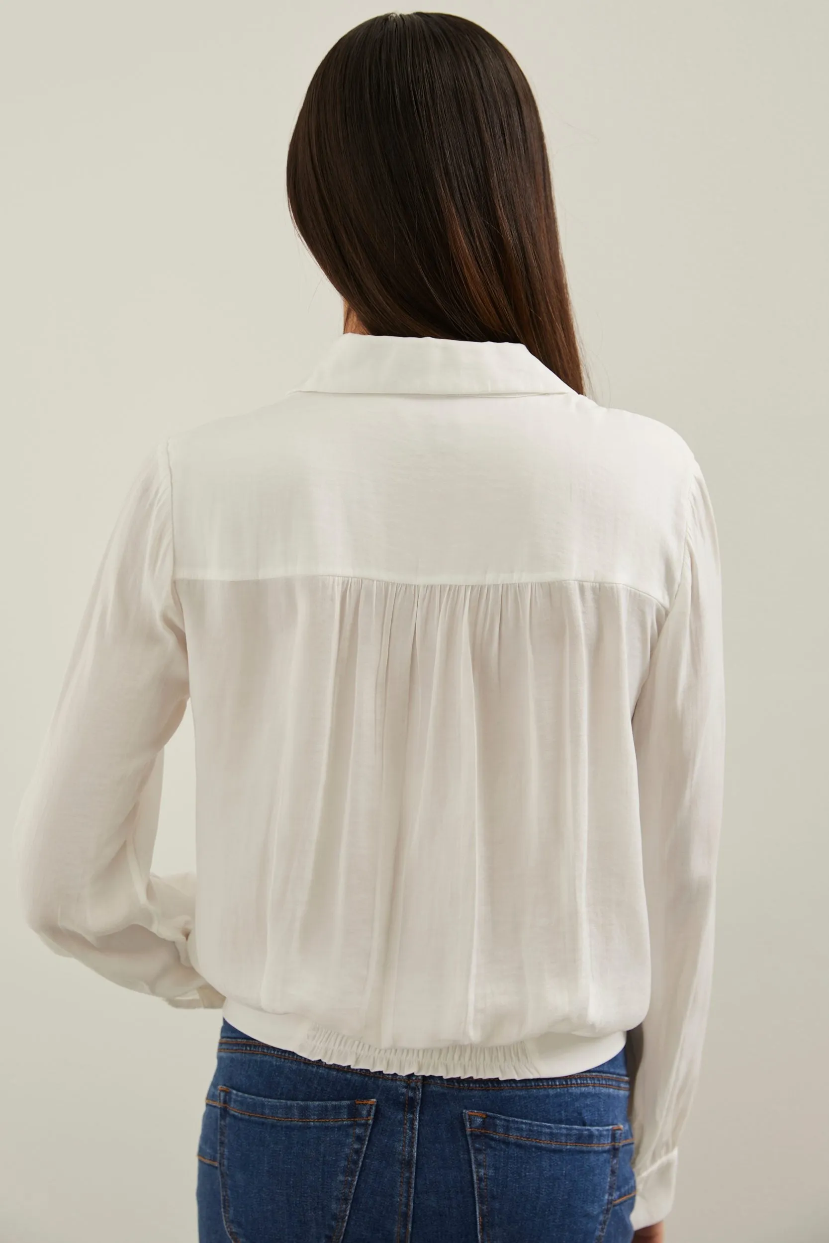 Blouse with tied hem